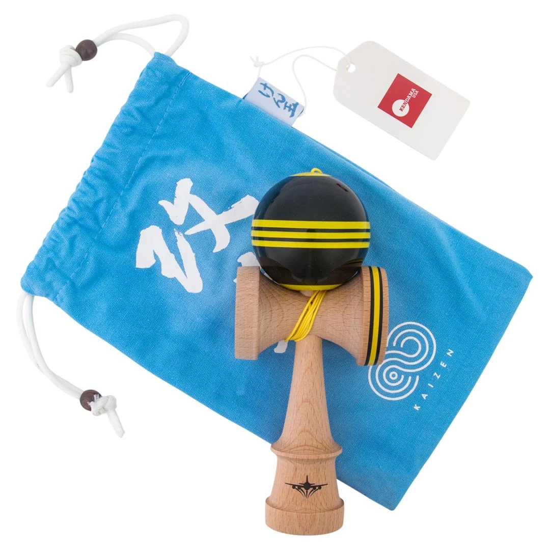 Kendama usa kaizen triple stripe jet shape black yellow beginner 4 bag